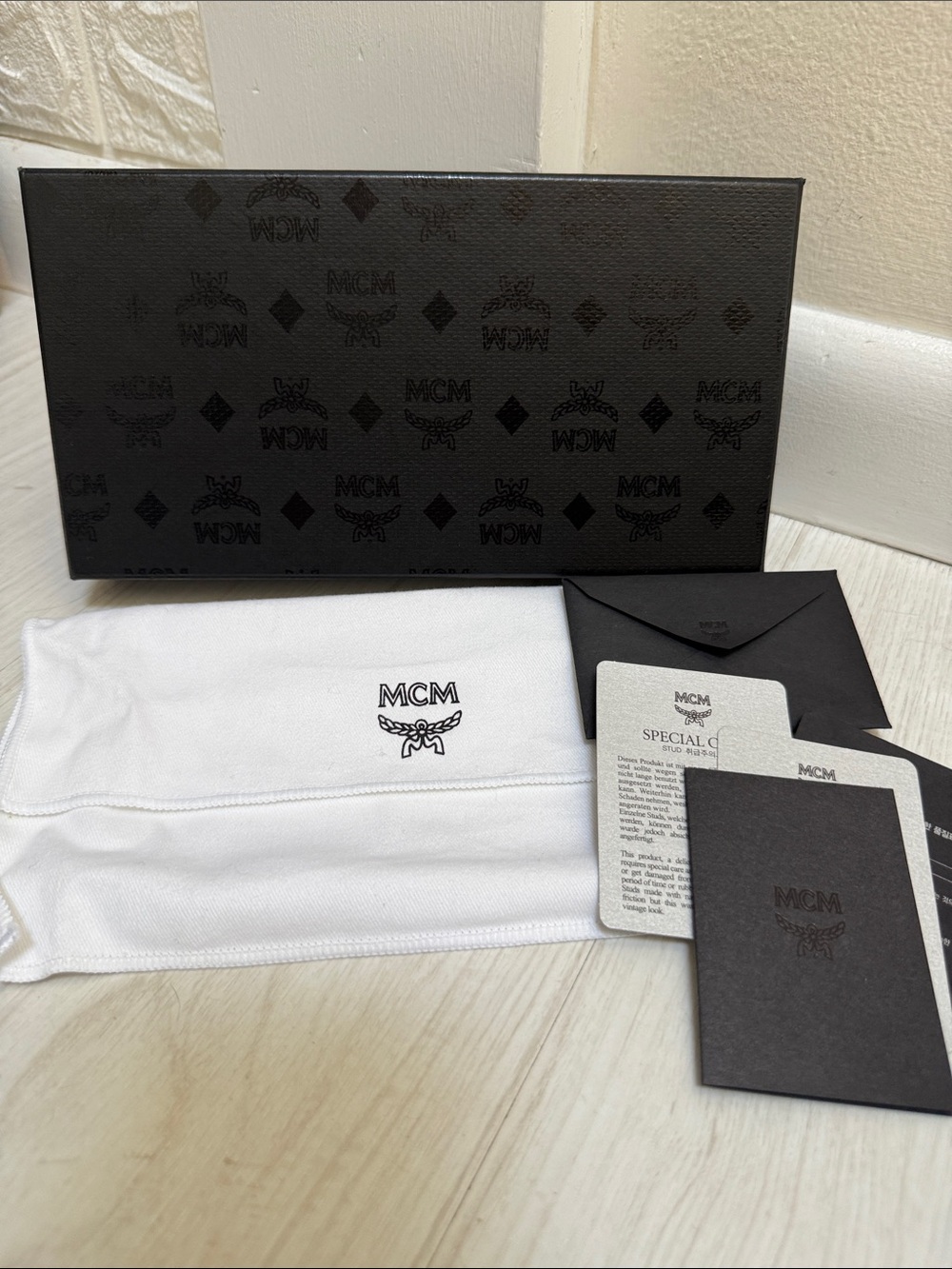New MCM Black Embossed Logo Wallet Dust Bag, Care Cards & MCM Box